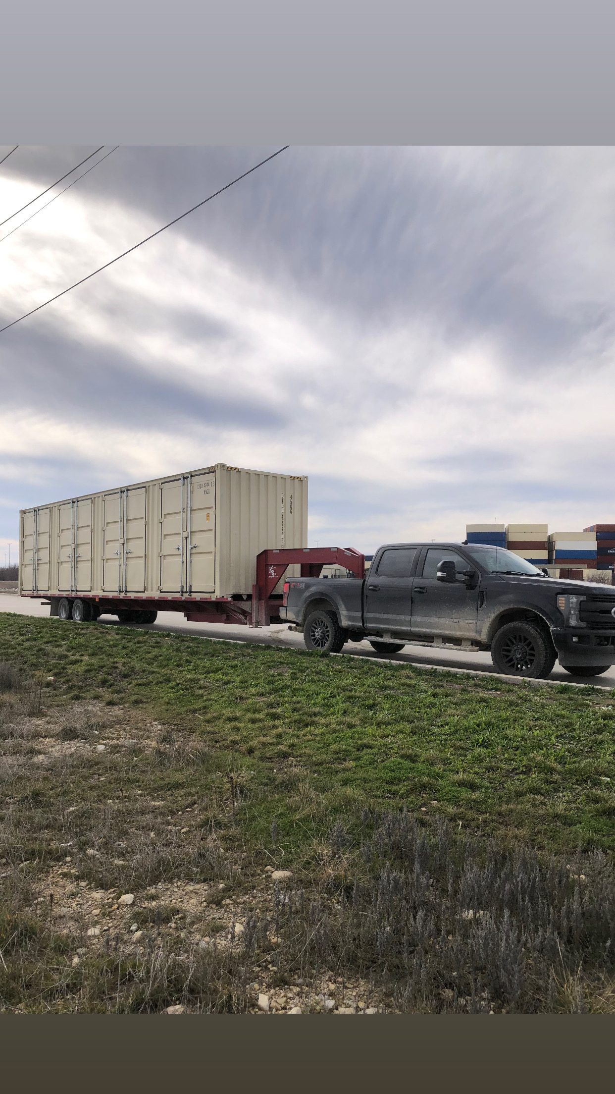 40-foot high-cube side-open container being transported