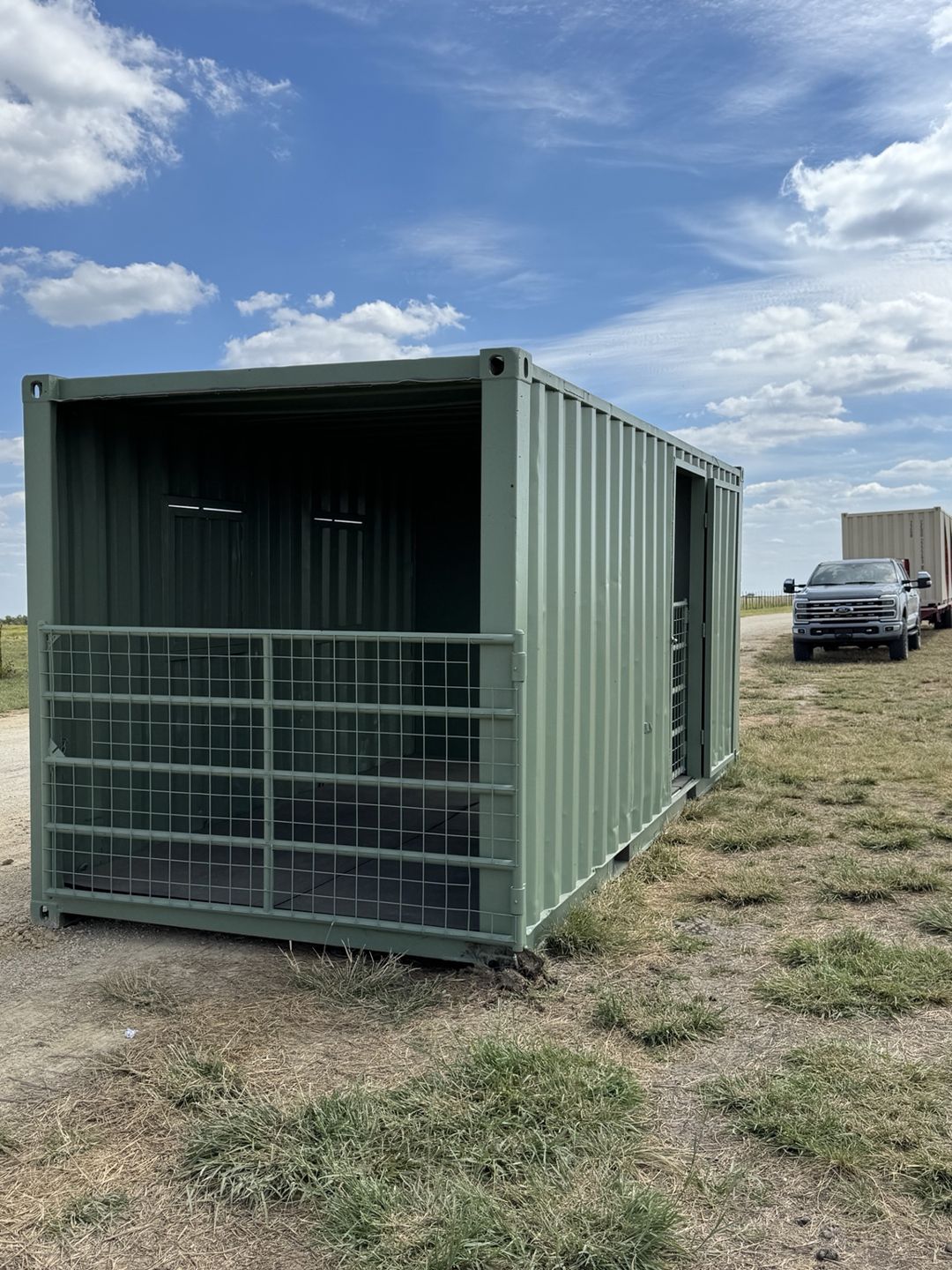 Custom green container with an open end and a side access opening